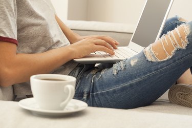 Young woman using laptop