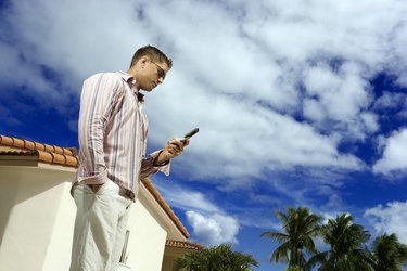 Man using cell phone outdoors