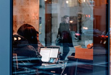 A customer using WiFi at a cafe