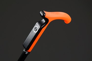 The Smartcane in orange and black.